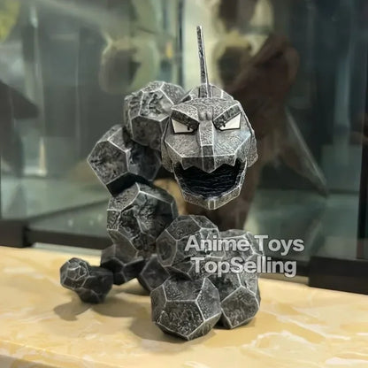 Figura detalhada de Onix com 14cm de altura em PVC, ideal para colecionadores e fãs da série Pokémon.